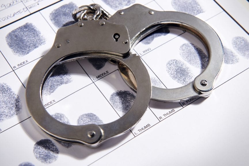 criminal record: handcuff and fingerprints